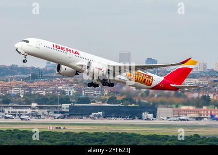 Madrid Barajas Airport. Iberia airline Airbus A350 airliner taking off. Stock Photo