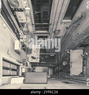 Dirty Vertigo, 2024. Light well in a building at downtown of the city of Catania, Sicily, italy Stock Photo