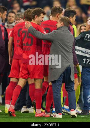 Thomas MUELLER, MÜLLER, FCB 25  Horst Heldt Geschäftsführer Profifußball Männer des 1. FC Union Berlin   celebrate  after the match  FC BAYERN MUENCHEN - 1.FC UNION BERLIN 3-0   on Nov 2, 2024 in Munich, Germany. Season 2024/2025, 1.Bundesliga, FCB,, München, matchday 9, 9.Spieltag Photographer: Peter Schatz   - DFL REGULATIONS PROHIBIT ANY USE OF PHOTOGRAPHS as IMAGE SEQUENCES and/or QUASI-VIDEO - Stock Photo