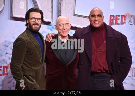 Chris Evans, J.K. Simmons und Dwayne Johnson bei der „Red One - Alarmstufe Weihnachten“ Film Premiere am 3.11.2024 in Berlin Stock Photo