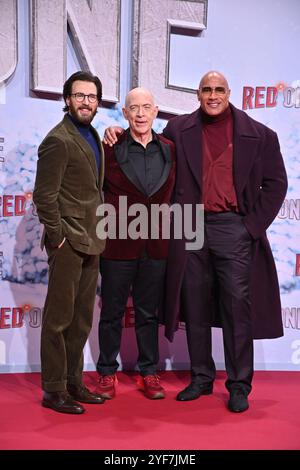 Chris Evans, J.K. Simmons und Dwayne Johnson bei der „Red One - Alarmstufe Weihnachten“ Film Premiere am 3.11.2024 in Berlin Stock Photo