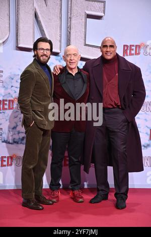 Chris Evans, J.K. Simmons und Dwayne Johnson bei der „Red One - Alarmstufe Weihnachten“ Film Premiere am 3.11.2024 in Berlin Stock Photo