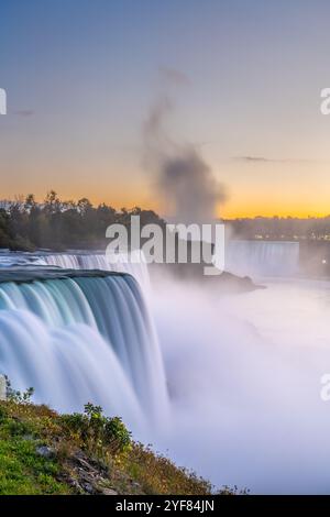 Niagara Falls, New York, USA from the rim of the falls on an autumn dusk. Stock Photo