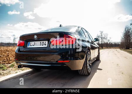 Black metallic sedan BMW 3-Series 320 F30 Twin Power Turbo, luxury car Stock Photo