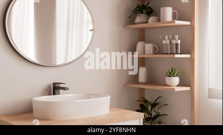 The interior design of a minimalist Scandinavian bathroom features a round mirror, a sink on a minimal wood counter, a wooden shelf with decor, and ho Stock Photo