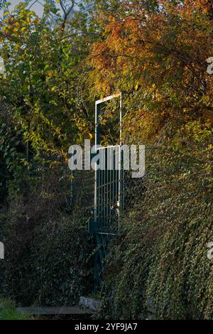 Gate to the garden in fall Stock Photo