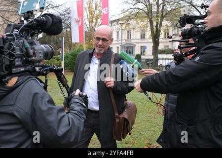 Potsdam, Germany. 04th Nov, 2024. Deputy Brandenburg BSW state chairman Niels-Olaf Lüders gives an interview on his way to the Regine-Hildebrandt-Haus, the headquarters of the Brandenburg SPD. He is meeting there for initial coalition negotiations with the SPD. Credit: Michael Bahlo/dpa/Alamy Live News Stock Photo