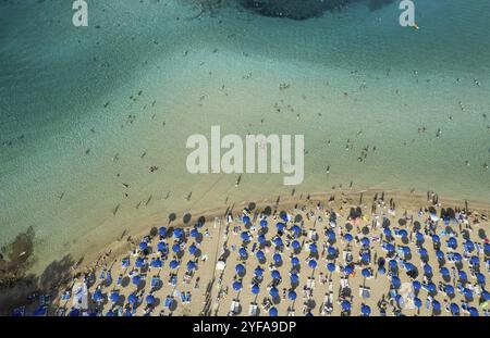 Aerial drone photograph of fig tree bay beach. with tourists relaxing and enjoying summer vacations cyprus Stock Photo