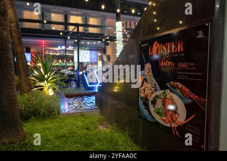 BANGKOK, THAILAND - DECEMBER 09, 2023: seafood lobster fest promotions poster as seen at Novotel Bangkok Ploenchit Sukhumvit. Stock Photo