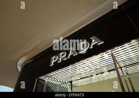 BANGKOK, THAILAND - DECEMBER 09, 2023: Prada brand name over store entrance in Central Embassy shopping mall in Bangkok. Stock Photo