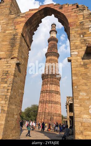 New Delhi, India, March 11 2017. Tourist prople sightseeing on the Qutub Minar tower. Part of Qutb complex a Unesceo world heritage site in the Mehrau Stock Photo