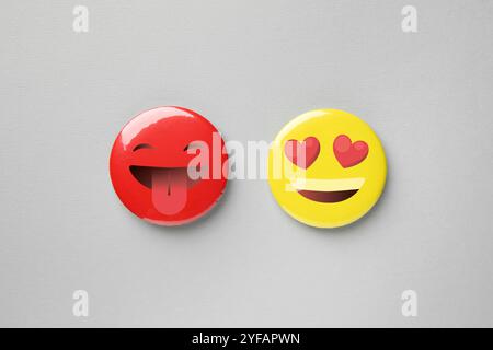 Badges displaying different emotions on grey background Stock Photo