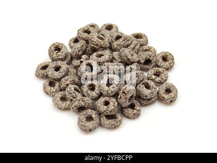 Pile of dry chocolate ring cereals isolated on white background Stock Photo