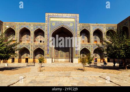 Inner courtyard of of Tilya-Kori-Madrasa or Tilla Kari Madrasah in famous Registan of Samarkand, Uzbekistan. Stock Photo