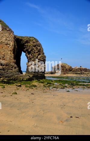 The Arch Rock Formation and Chapel Rock Island on Perranporth Beach on the Southwest Coastal Path, North Cornwall, England, UK Stock Photo