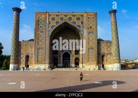 The Ulugbek Madrasah located by Registan Square in the historic center of Samarkand, Uzbekistan. The madrasah was built by the order and under the dir Stock Photo