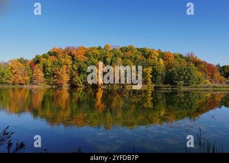 Fall Color Reflecting in Beebe Lake on Cornell's Campus in Ithaca, New York Stock Photo