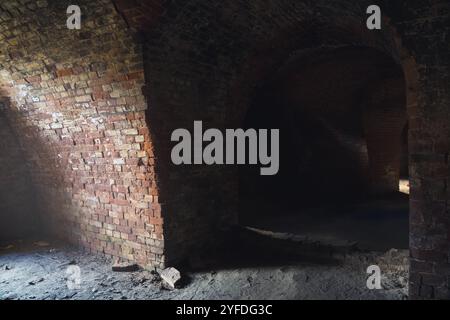 Brick walls and arches in the Bobruisk fortress. Sunlight inside the fortress Stock Photo