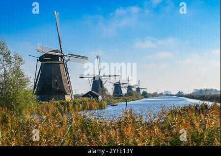 Dutch Windmills along the Waterfront in Kinderdijk, The Netherlands. Stock Photo