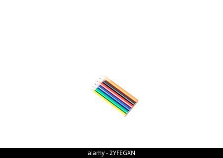 Colored pencils isolated on white background. Wooden color pencils arranged in bulk. Back to school idea concept. Copy space, blank, empty. Student. Stock Photo