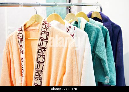 Colored terry robes on a mannequin in a store Stock Photo
