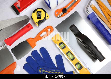Flat lay composition with different construction tools on grey textured table Stock Photo