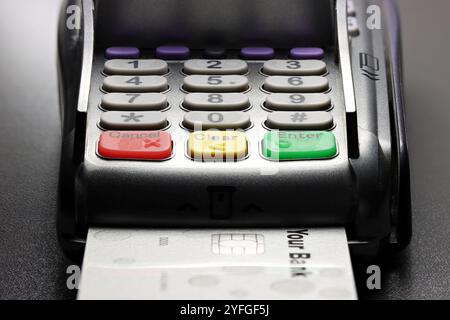 payment terminal with generic bank card on counter Stock Photo