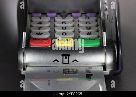 payment terminal with generic bank card on counter Stock Photo