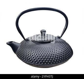 Traditional black Asian cast Iron Kettle or Teapot isolated on white background. Authentic Japanese Black Cast Iron Kettle with clipping path. Stock Photo