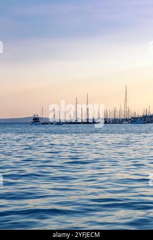 View of sailboats at the Split marina at sunset , Split, Croatia Stock Photo