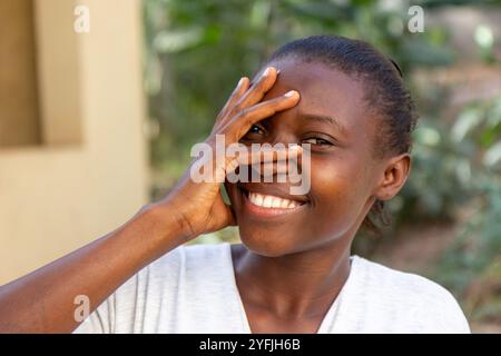 A young smiling Ugandan woman. Stock Photo