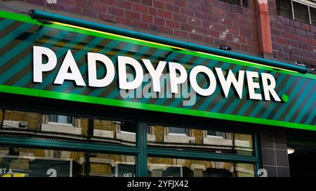 London, UK - September 20, 2024 - Sign at Irish gambling company business Paddy Power in closeup Stock Photo