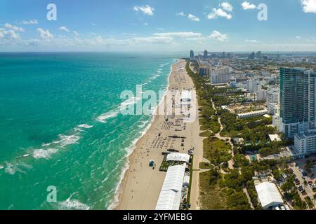 Miami Beach city with high luxury hotels and condos and sandy beachfront. High angle view of tourist infrastructure in southern Florida, USA. Stock Photo