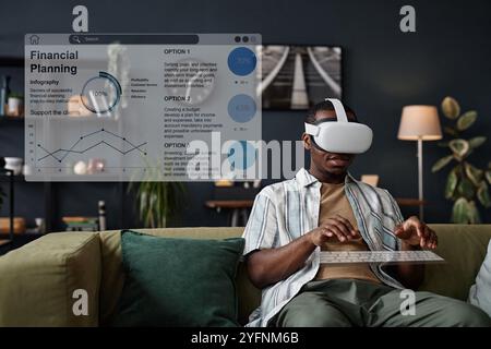 Young Man Using Virtual Keyboard Stock Photo