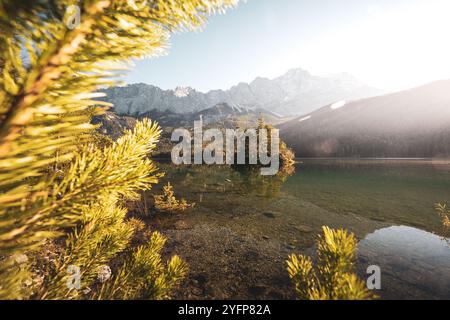 An den Ufern des Eibsees, der aufgrund seiner Lage unterhalb der Zugspitze und des klaren, grün getönten Wassers als einer der schönsten Seen der bayrischen Alpen gilt. Im Herbst zu Sonnenaufgang am 31.10.2024. // On the banks of the Eibsee, which is considered one of the most beautiful lakes in the Bavarian Alps due to its location below the Zugspitze and the clear, green-tinted water. In autumn at sunrise on October 31st, 2024. - 20241031 PD14466 Credit: APA-PictureDesk/Alamy Live News Stock Photo