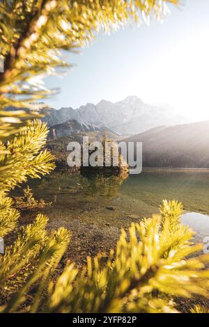 An den Ufern des Eibsees, der aufgrund seiner Lage unterhalb der Zugspitze und des klaren, grün getönten Wassers als einer der schönsten Seen der bayrischen Alpen gilt. Im Herbst zu Sonnenaufgang am 31.10.2024. // On the banks of the Eibsee, which is considered one of the most beautiful lakes in the Bavarian Alps due to its location below the Zugspitze and the clear, green-tinted water. In autumn at sunrise on October 31st, 2024. - 20241031 PD14464 Credit: APA-PictureDesk/Alamy Live News Stock Photo