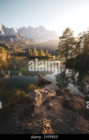 An den Ufern des Eibsees, der aufgrund seiner Lage unterhalb der Zugspitze und des klaren, grün getönten Wassers als einer der schönsten Seen der bayrischen Alpen gilt. Im Herbst zu Sonnenaufgang am 31.10.2024. // On the banks of the Eibsee, which is considered one of the most beautiful lakes in the Bavarian Alps due to its location below the Zugspitze and the clear, green-tinted water. In autumn at sunrise on October 31st, 2024. - 20241031 PD14468 Credit: APA-PictureDesk/Alamy Live News Stock Photo