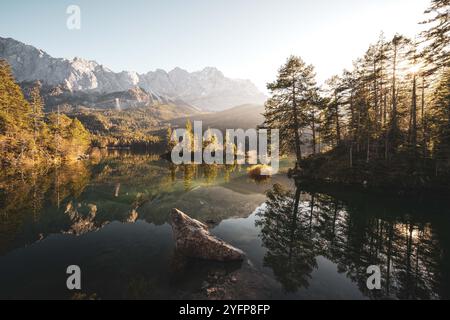 An den Ufern des Eibsees, der aufgrund seiner Lage unterhalb der Zugspitze und des klaren, grün getönten Wassers als einer der schönsten Seen der bayrischen Alpen gilt. Im Herbst zu Sonnenaufgang am 31.10.2024. // On the banks of the Eibsee, which is considered one of the most beautiful lakes in the Bavarian Alps due to its location below the Zugspitze and the clear, green-tinted water. In autumn at sunrise on October 31st, 2024. - 20241031 PD14458 Credit: APA-PictureDesk/Alamy Live News Stock Photo