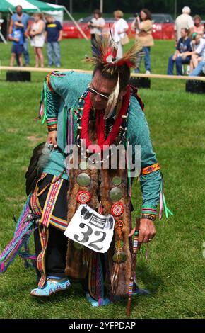 ANDERSON, IN, USA-SEPTEMBER 09,2007:Unidentified Native American Man  in Traditional clothing dancing during Annual Pow Wow on Grass Stock Photo