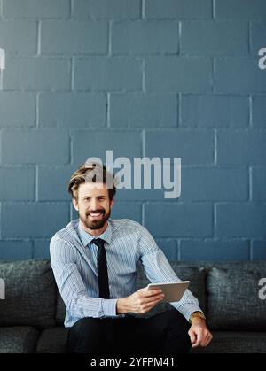 Portrait, tablet and digital with business man for cloud solutions architect, it consultant or mockup. Web, framework and smile with person on wall Stock Photo