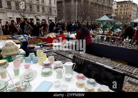 The saturday flea market section of  Naschmarkt on  Linke Wienzeile. Bric-a-brac stall selling a range of second-hand household.  Vienna. Austria. Stock Photo