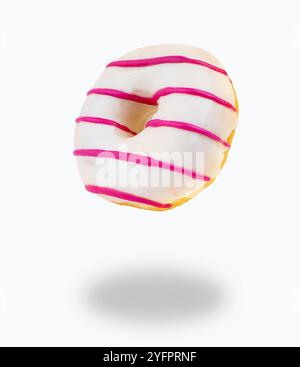 Flying donut made of  chocolate white and pink stripes with isolated on white background Stock Photo