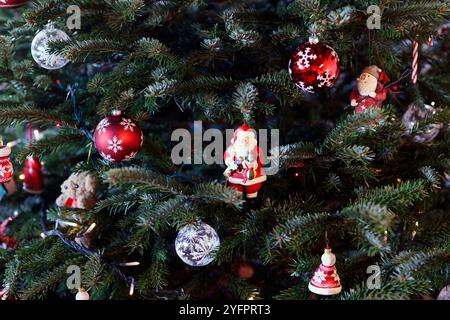 Christmas tree decorated with ornaments. Stock Photo