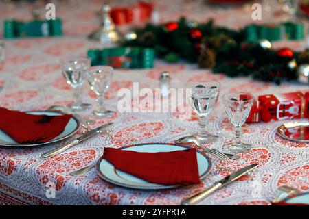 Table served for Christmas dinner in living room. Christmas celebration; Stock Photo