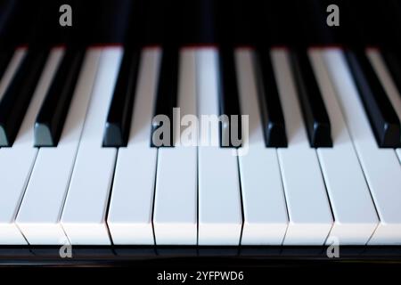 Black Yamaha piano. Close up of the keyboard. Stock Photo
