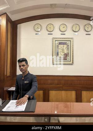 Hotel receptionist in Mumbai, India Stock Photo