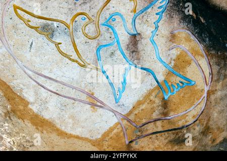 Catholic church. Doves of peace on a rock. Stock Photo