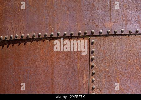 Texture of rusty metal plates in old abandoned industry, Minas Gerais, Brazil, South America Stock Photo