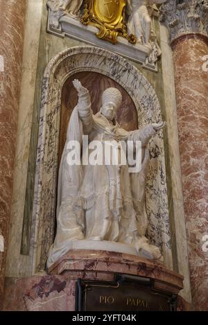Marble statue in the central nave of St. Peter's Basilica, Rome ...