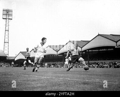 Wolverhampton Wanderers footballer Billy Wright and Barry Stobart during his last match August 8th 1959 . Stock Photo